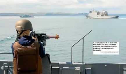  ?? PHOTO: LAINE MOGER/STUFF ?? A sailor gets ready to deal with the ‘‘worst day ever’’ as crews from five naval vessels train off Auckland’s Whangapara­oa Peninsula.