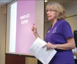  ?? Dan Watson/The Signal ?? Linda Davies, executive director of the Domestic Violence Center of Santa Clarita begins the Work-Place Toolkit: What You Can Do seminar during the Domestic Violence Summit held at College of the Canyons in Valencia on Friday.