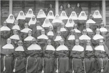  ?? MemSSF VIA AP ?? This 1898 photo provided by the Sisters of the Holy Family (SSF) shows bers of the religious order of African-American nuns in New Orleans.