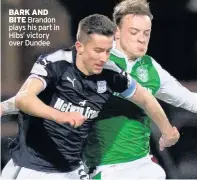  ??  ?? BARK AND BITE Brandon plays his part in Hibs’ victory over Dundee