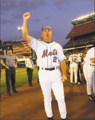  ?? Getty Images ?? Mets manager Bobby Valentine leads the Shea Stadium crowd in a “Rudy” chant in honor of then- Mayor Rudy Giuliani on Sept. 21, 2001, before a game against the Braves.