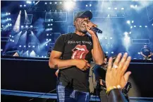  ?? PHOTO BY AMY HARRIS/INVISION/AP ?? Darius Rucker performs during CMA Fest 2022 on June 9 at Nissan Stadium in Nashville, Tennessee. He’ll perform today at the Rose Music Center at The Heights.