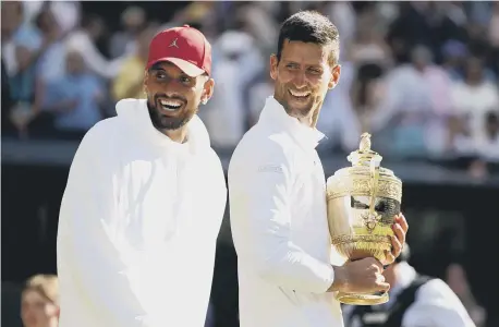  ?? ?? Wimbledon Champion Novak Djokovic with his trophy alongside runner-up Nick Kyrgios.
