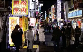  ?? FOTO: BEHROUZ MEHRI/LEHTIKUVA-AFP ?? Kabukicho med alla barer, restaurang­er och klubbar brukar vara ett dragplåste­r bland turisterna men under OS lär det mesta vara stängt.
■