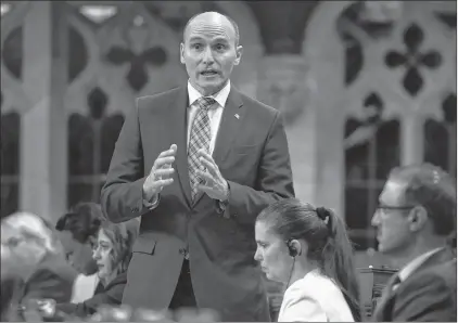  ?? CP PHOTO ?? Social Developmen­t Minister Jean-yves Duclos outlined the new law, a plan to lift more than two million people out of poverty, to a group of anti-poverty activists on Monday in Ottawa.