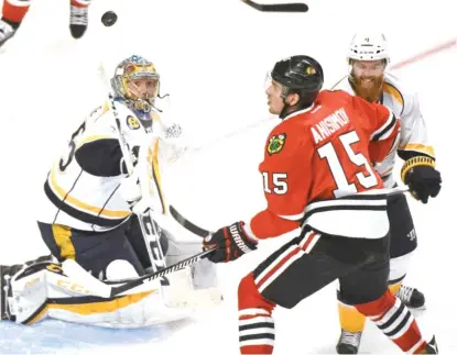  ?? | AP ?? Blackhawks center Artem Anisimov couldn’t get the puck past Predators goalie Pekka Rinne on Thursday at the United Center.