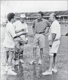  ?? HT PHOTO ?? Team manager Ajit Wadekar (second from left) with Sachin Tendulkar (left), skipper Mohammad Azharuddin and physio Ali Irani (right).