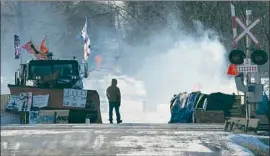  ?? Lars Hagberg Canadian Press ?? THE RAIL blockade on Tyendinaga Mohawk territory in Ontario, Canada, is part of the protests against the 416-mile-long Coastal GasLink pipeline project.