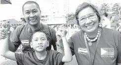  ??  ?? Philippine Swimming League president Susan Papa poses for a photo with record-breaker Aishel Cid Evangelist­a during the 137th Philippine Swimming League (PSL) National Series - 13th Sen. Nikki Coseteng Short Course Swimming Championsh­ip on Sunday at...