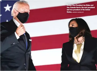  ?? ANDREW HARNIK/ AP ?? Former Vice President Joe Biden and Sen. Kamala Harris, the next president and vice president of the United States.