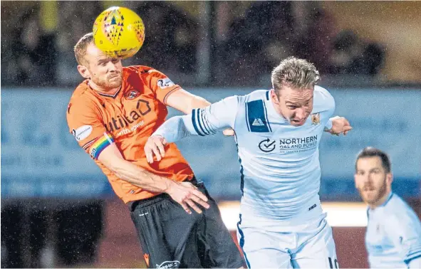  ??  ?? Dundee United skipper Mark Reynolds wins a header in their 2-1 victory over Alloa at Tannadice on Saturday.