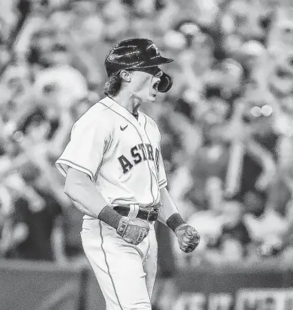  ?? Brett Coomer / Staff photograph­er ?? Center fielder Jake Meyers celebrates his RBI single that drove in designated hitter Yordan Alvarez during the second inning.