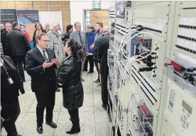  ?? SCOTT GARDNER THE HAMILTON SPECTATOR ?? Mohawk College president Ron McKerlie, left in the foreground, was one of a few officials Thursday to check out the former hydro substation on Market Street that will serve as a training lab for Mohawk College students.