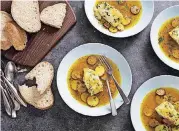  ?? [PHOTO BY STEVE KLISE, AMERICA’S TEST KITCHEN/AP] ?? This recipe for cod in saffron broth with chorizo and potatoes appears in the cookbook “Dinner Illustrate­d.”