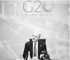  ??  ?? The European Commission­er for Economic and Financial Affairs, Taxation and Customs, French Pierre Moscovici, gives a press conference in Buenos Aires, on July 22, in the framework of the G20 meeting of Finance Ministers and Central Bank Governors. —...