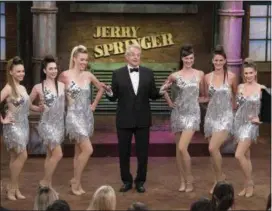  ?? THE ASSOCIATED PRESS ?? This Aug. 24, 2015 photo provided by NBC shows host Jerry Springer, center, during taping of the 25th anniversar­y episode of “The Jerry Springer Show,” in Stamford, Conn.