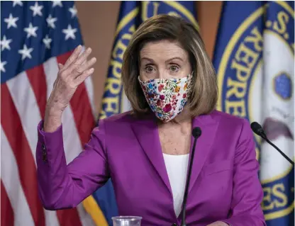  ?? FOTO: J SCOTT APPLEWHITE/TTAP ?? ■
Nancy Pelosi, demokrat och talman i USA:s representa­nthus, meddelar att kammaren i början av veckan kommer att rösta för att uppmana vicepresid­ent Mike Pence att avsätta president Donald Trump.