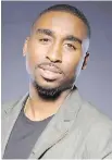  ??  ?? Demetrius Shipp Jr. bears a strong resemblanc­e to Tupac Shakur.