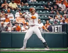  ?? University of Texas / Courtesy photo ?? Skyler Messinger, a graduate of Niwot High School, takes an at-bat for the Texas Longhorns during the 2022 season. Texas reached the College World Series this season, after
Messinger transferre­d from Kansas.