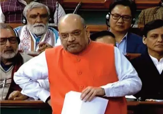  ??  ?? Home Minister Amit Shah addressing the Rajya Sabha on the Delhi riots