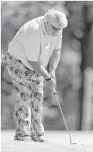  ?? Wilf Thorne ?? John Daly sinks a putt on No. 13 en route to a first-round 68 in the Insperity Invitation­al on Friday at The Woodlands Country Club.