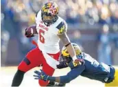  ?? PAUL SANCYA/AP ?? Maryland Terrapins running back Ty Johnson, left, returns after rushing for more than 1,000 yards last season.