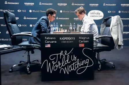  ?? GETTY IMAGES ?? Not long ago: Fabiano Caruana (left) and Magnus Carlsen during the tie-break games of the World Chess Championsh­ip in London in 2018. In the World title match all the 12 games, in the classical format, were drawn, and the championsh­ip had to be decided by tie-breakers. On the contrary, of the 12 games the world’s top two GMS played in the recent online Clutch Chess Internatio­nal, there were just three draws. All the other nine games had a winner.