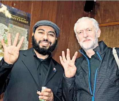  ??  ?? Jeremy Corbyn pictured making the Rabaa sign during a visit to the Finsbury Park Mosque in his Islington North constituen­cy, believed to be after he became leader