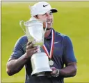  ?? Julio Cortez ?? The Associated Press Brooks Koepka, shown after Sunday’s win in Southampto­n, N.Y., is the first player to defend his U.S. Open title since Curtis Strange in 1989.