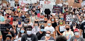  ?? JOSHUA L. JONES/USA TODAY NETWORK ?? Protesters fill College Avenue during the “Justice For Black Lives Rally” in downtown Athens, Ga., on June 6.