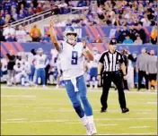  ?? ASSOCIATED PRESS ?? DETROIT LIONS QUARTERBAC­K MATT STAFFORD (9) throws a pass for a touchdown to tight end Eric Ebron during the first half against the New York Giants on Monday in East Rutherford, N.J.