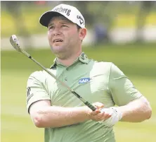  ?? Tom Reel / San Antonio Express-News ?? Branden Grace watches his wedge shot on No. 18 at TPC San Antonio. Grace enjoyed his best round since January.