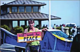  ?? File photo ?? Nancy Leman of Sacramento, with other anti-drone demonstrat­ors, holds a Good Friday event in April 2014 at the Beale Air Force Base Main Gate in Linda.