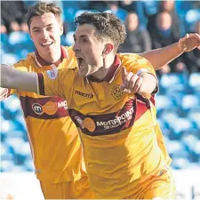  ??  ?? Motherwell defender Carl McHugh celebrates his goal.