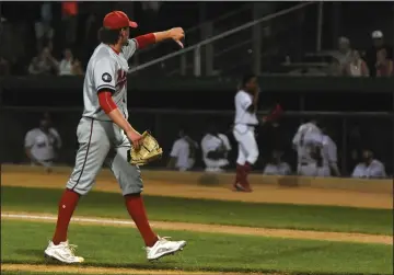  ?? NEWS PHOTO JAMES TUBB ?? Medicine Hat Mavericks pitcher Gerrit Erickson gives a thumbs down to the Regina Red Sox bench gladiator style after getting the final out in his team’s 11-7 win in Game 1 of their East Division semifinal series Monday in Regina.