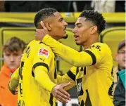  ?? (AFP) ?? Borussia Dortmund's Sebastien Haller (L) celebrates with Jude Bellingham after scoring against Freiburg on Saturday