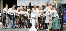  ??  ?? MEMBERS of the organising committee of the Biomin World Nutrition Forum 2018 with “Miss Pepper”, the humanoid robot.