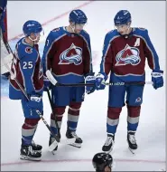  ?? AARON ONTIVEROZ — THE DENVER POST ?? Logan O’connor (25), Devon Toews (7) and Cale Makar (8) of the Colorado Avalanche talk on the ice during the second period against the Anaheim Ducks at Ball Arena in Denver on Wednesday, November 15, 2023.