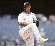  ?? Adam Hunger / Associated Press ?? The Yankees’ Nestor Cortes pitches during the first baseball game of a doublehead­er against the Angels on Thursday in New York.