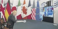  ??  ?? 0 Boris Johnson hosts a virtual meeting of G7 leaders