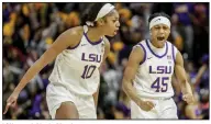 ?? (AP/Derick Hingle) ?? LSU guard Alexis Morris (45) and forward Angel Reese celebrate following a basket against Georgia in overtime Thursday in Baton Rouge. Reese had game highs of 23 points and 14 rebounds, and Morris added 15 points in an 82-77 victory.