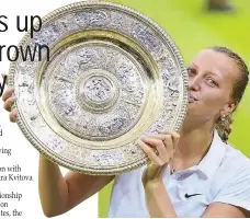  ?? EPA ?? Petra Kvitova hugs her second Wimbledon trophy.
