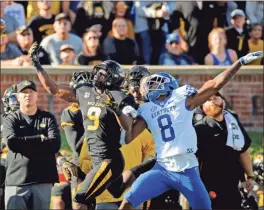  ?? / AP-Charlie Riedel ?? Kentucky cornerback Derrick Baity Jr. breaks up a pass intended for Missouri wide receiver Jalen Knox during the first half of the game on Saturday in Columbia, Mo.