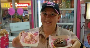  ?? PHOTO: ?? TASTY TREATS: Samantha Travers with the new Ungrown-Up range of doughnuts. MEGHAN HARRIS