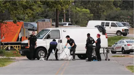  ?? Steve Gonzales / Houston Chronicle ?? A woman was hit by a car, then dragged for several hundred feet along an Interstate 69 feeder road in northeast Harris County early Monday. Authoritie­s were still searching for the driver in the deadly incident.