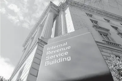  ?? SUSAN WALSH/AP 2013 ?? Billionair­es often pay little in income taxes because they don’t typically make money from a salary, notes Jonah Goldberg.