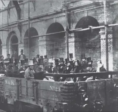  ?? Picture:getty ?? Tube with a view: William Ewart Gladstone, front row near right, with officials of the Metropolit­an Railway Company, on an inspection tour of the world’s first undergroun­d line in May 1862 it opened in January of the following year