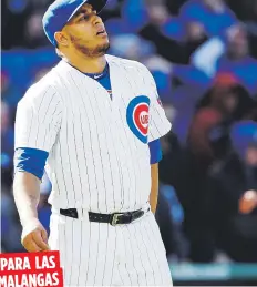  ??  ?? PARA LAS
MALANGAS
El relevista de los Cachorros, Héctor Rondón, se lamenta luego de permitir el cuadrangul­ar, de Brett Gardner, que le dio la victoria a los Yankees.