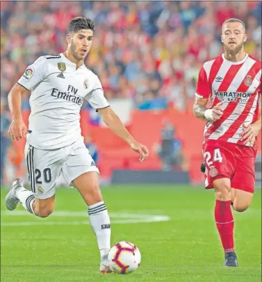  ??  ?? FUE CLAVE. El Girona le hizo a Asensio dos penaltis que el Madrid utilizó para remontar en el marcador.