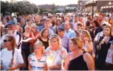  ?? PATRICK SEMANSKY/ AP ?? Mourners stand in silence Friday during a vigil for the victims of the Capital Gazette newsroom shooting in Annapolis, Maryland.